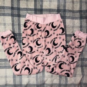 Pink fleece “night mode” pajama pants
